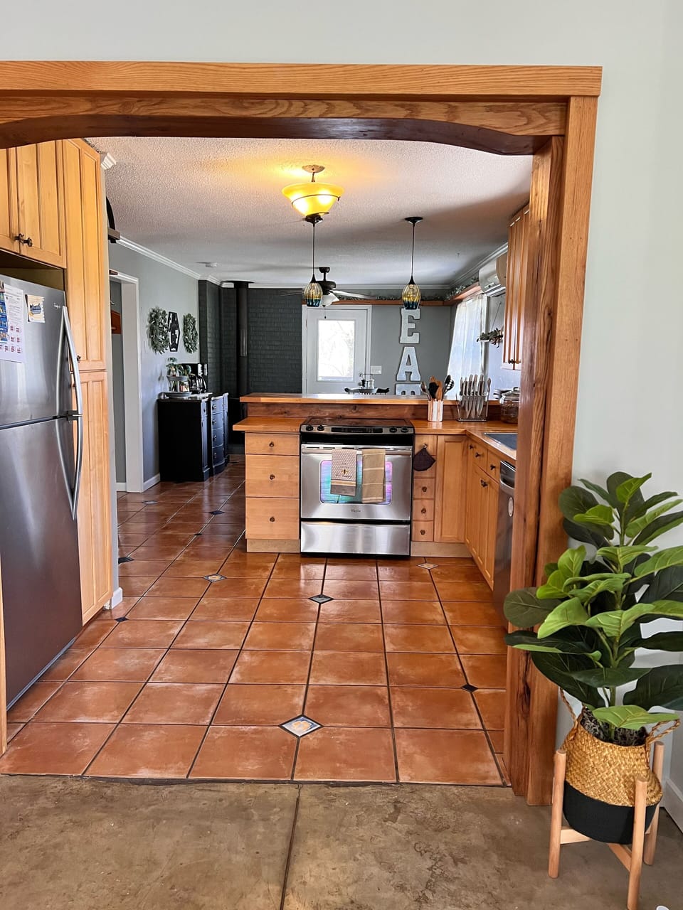 Open concept kitchen, living, and dining rooms-the perfect entertaining space