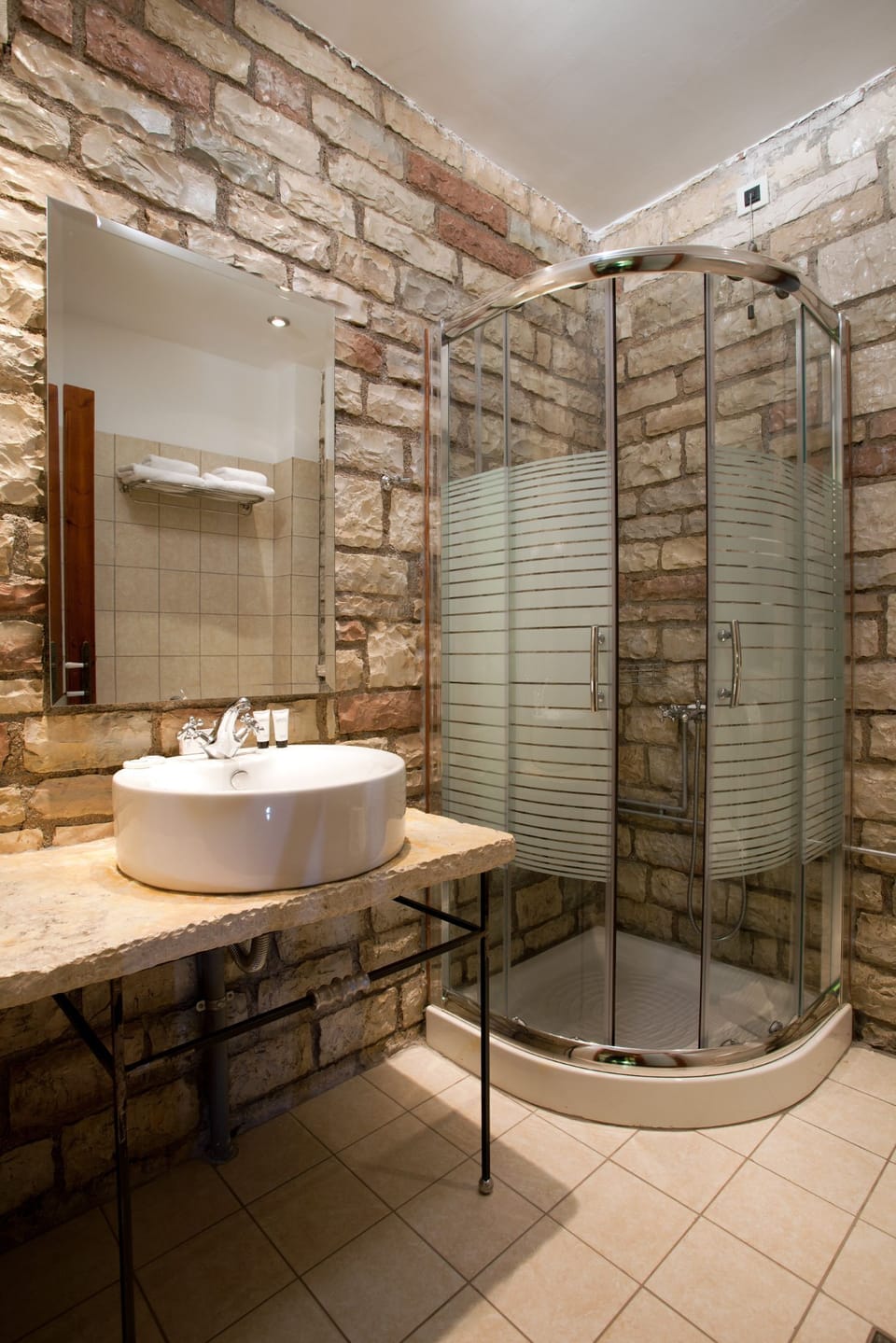 Shower, hair dryer, slippers, towels