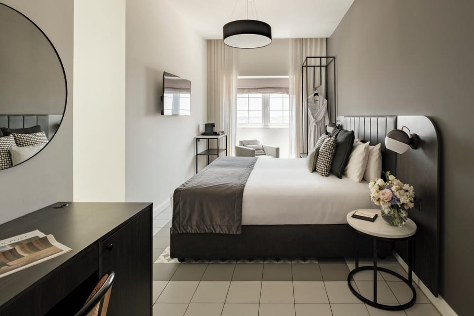 Junior Suite, Sea View | Premium bedding, minibar, in-room safe, individually decorated