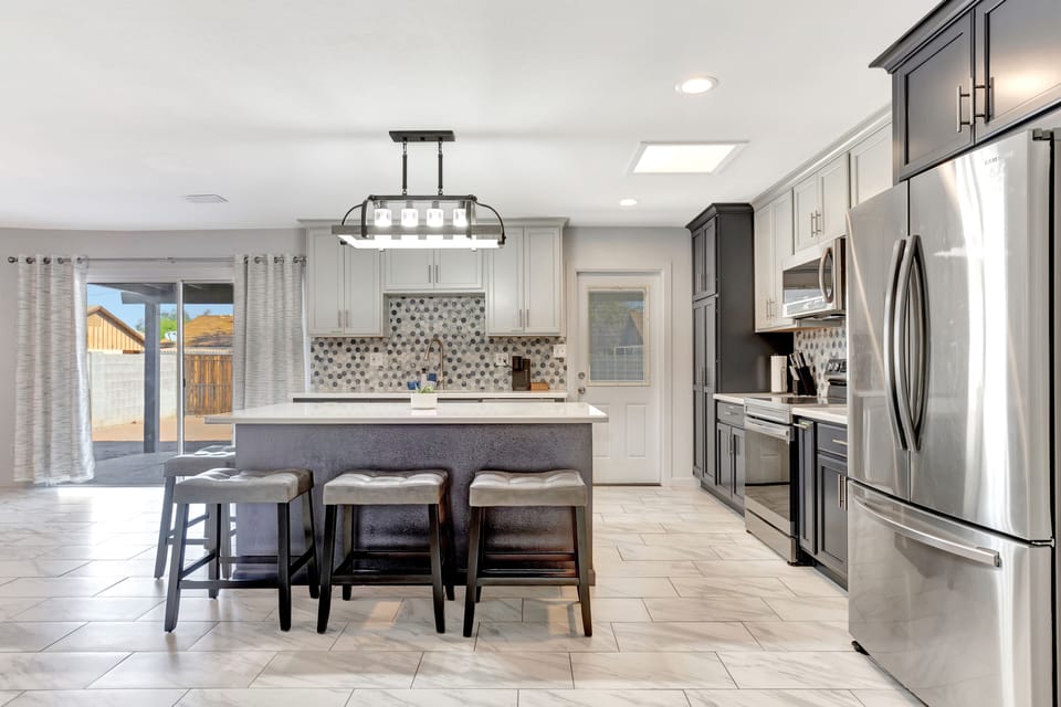 Note the kitchen island with seating for 4