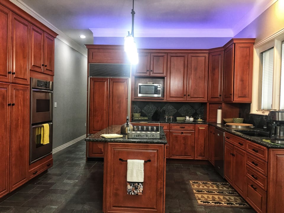 Large kitchen with double oven , all small appliances and space for prep.