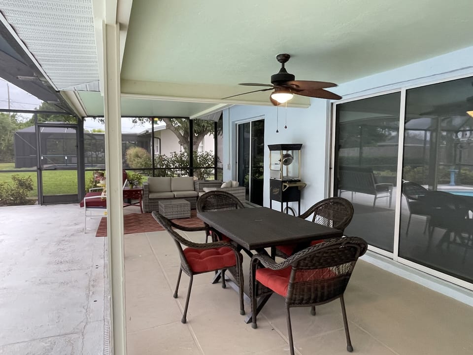Relax & bask in this sunny lanai while enjoying the smell of hibiscus 🌺