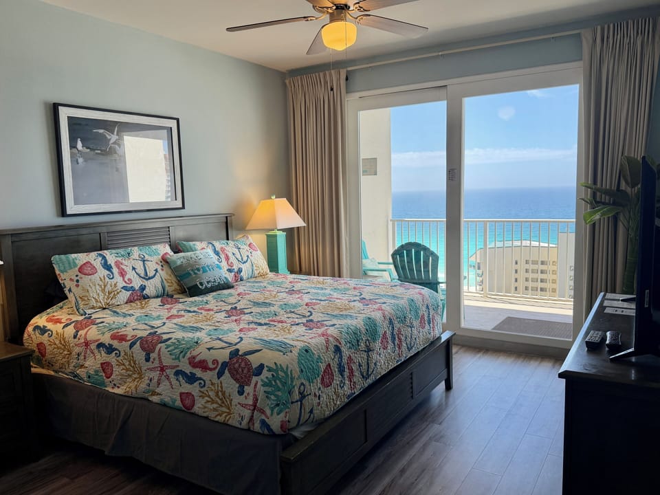 Wake up each morning to a view of the ocean blue from the king-sized bed