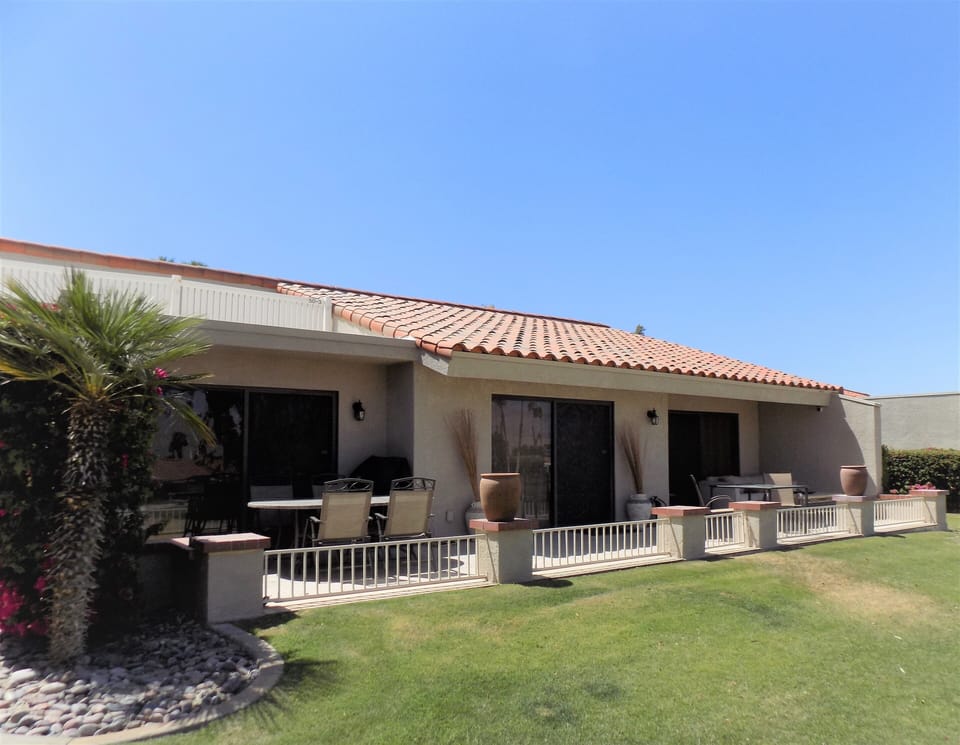 Large back patio includes BBQ