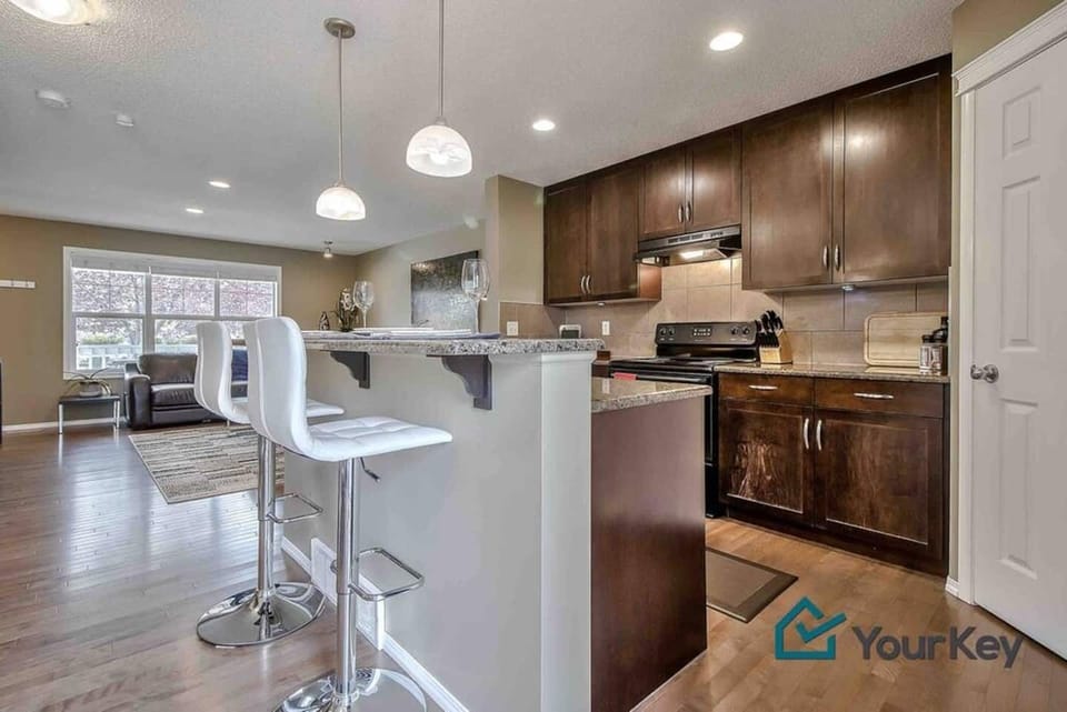 Island seating make it a great space for social cooking. 