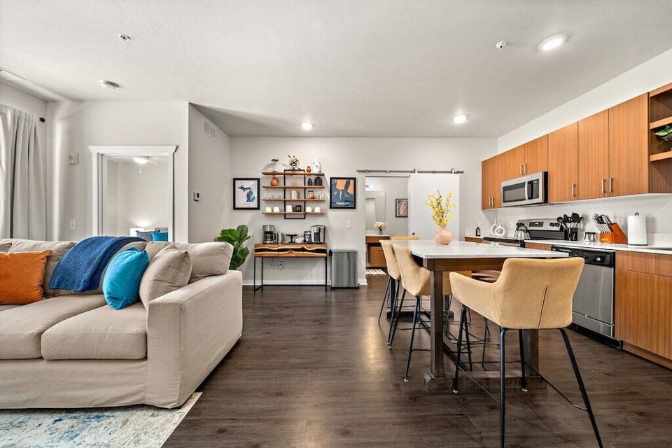The kitchen is a welcoming space with an island that doubles as dining for 6.