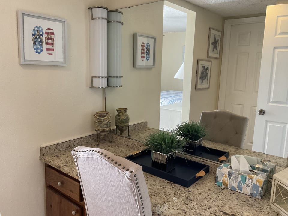 Vanity area in primary bedroom , or desk if you need work space 