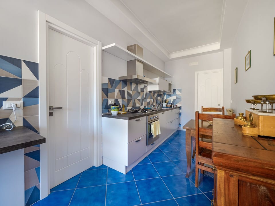 Comfort Apartment | Private kitchen | Full-size fridge, microwave, oven, stovetop