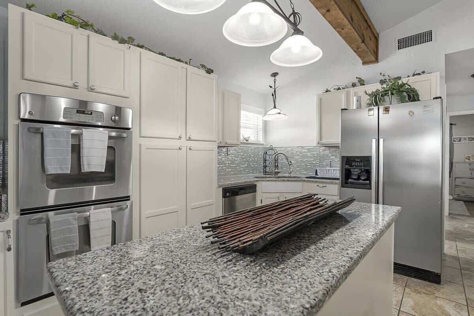 Enjoy preparing meals in our modern, well-stocked kitchen.
