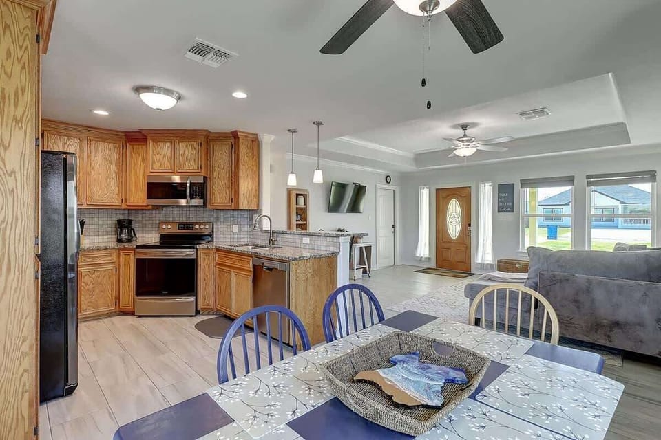 Open Living, Dining, and Kitchen. 