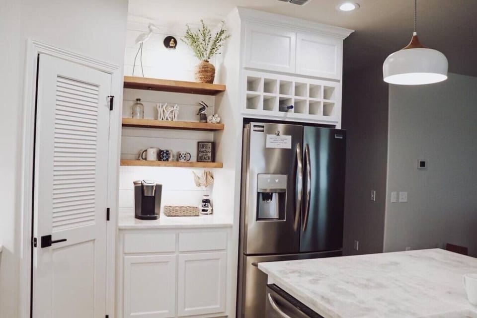 Start your day in the built-in coffee nook, and stock up with ease in the full-size fridge.