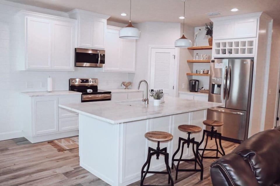 Modern kitchen with a large island that’s both stylish and functional.