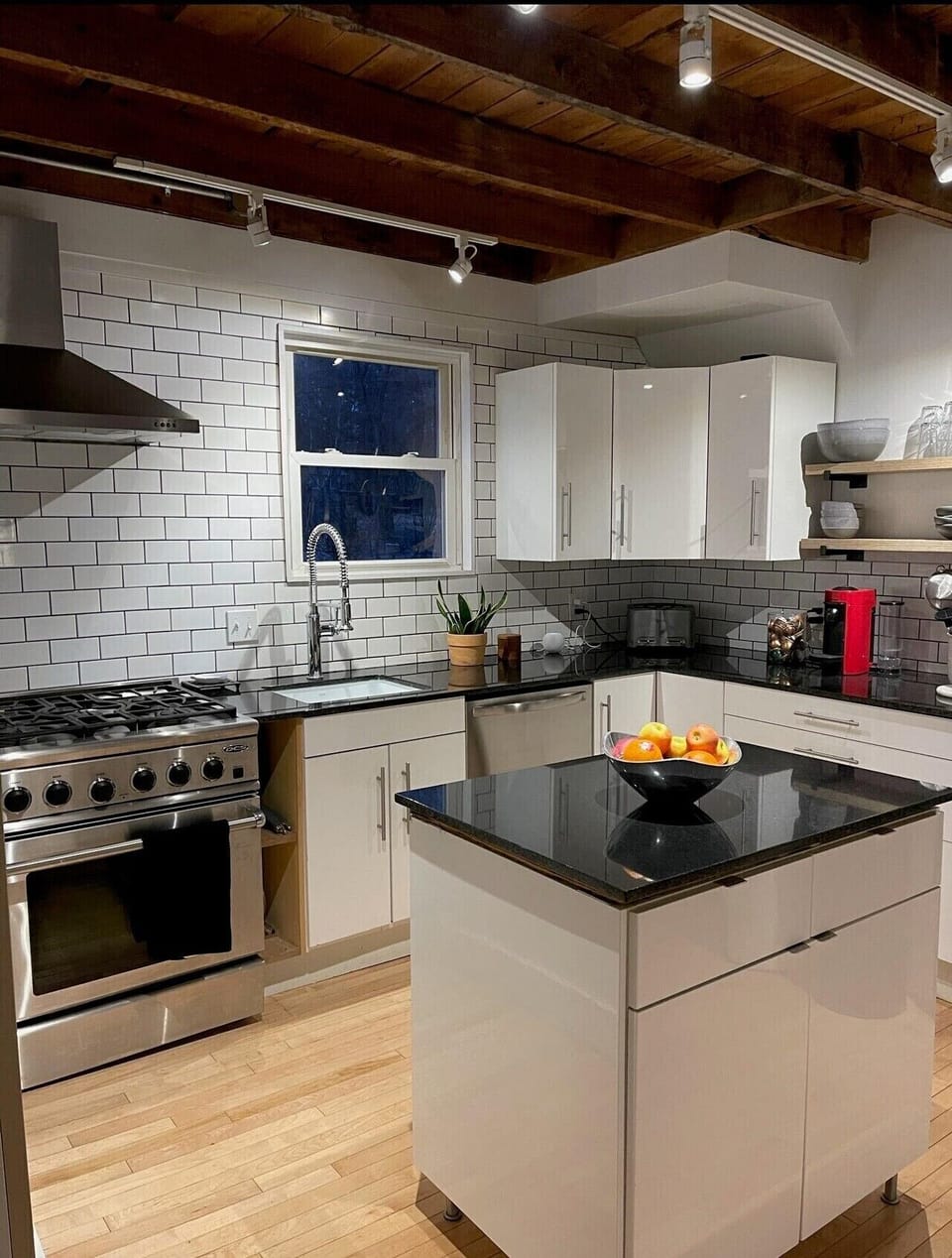 Plenty of counter space!  A drip coffee maker is provided for coffee.  Other amenities include dish soap, dishwasher tabs, a sponge, laundry detergent, and a roll of paper towels.