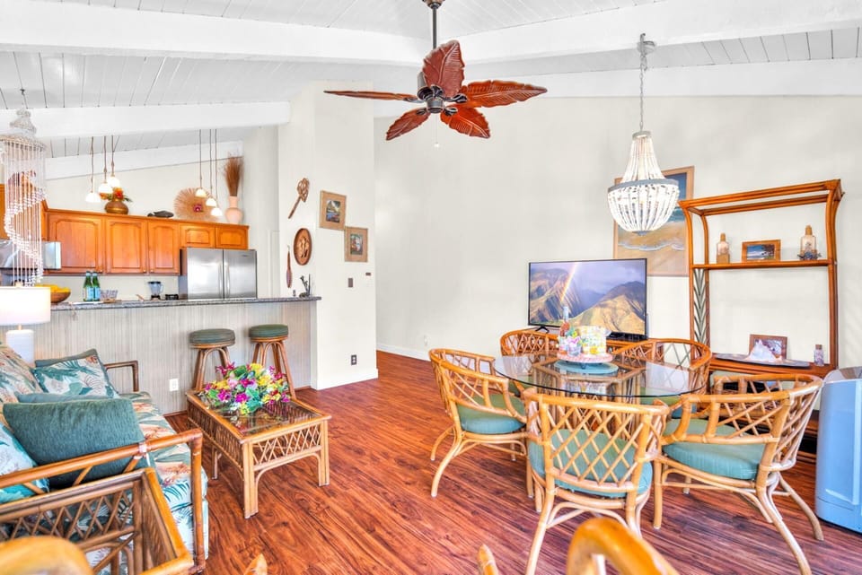 Charming great room with a full kitchen, bar seating, and inviting décor—perfect for sharing meals and memories.