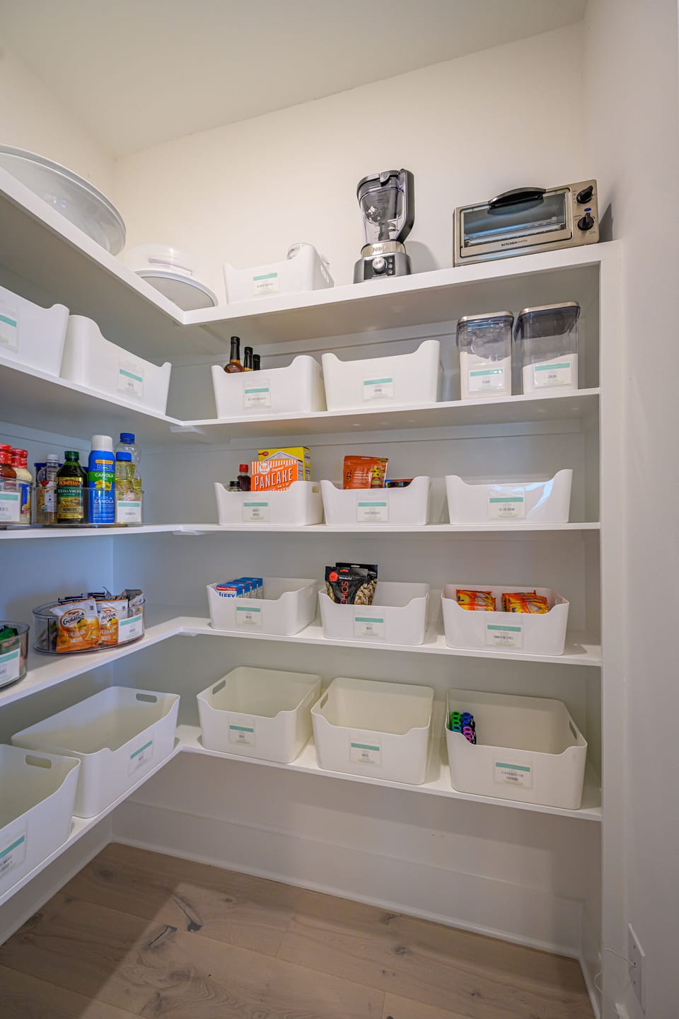 Organized and labeled pantry. Stocked with complimentary snacks and other items.