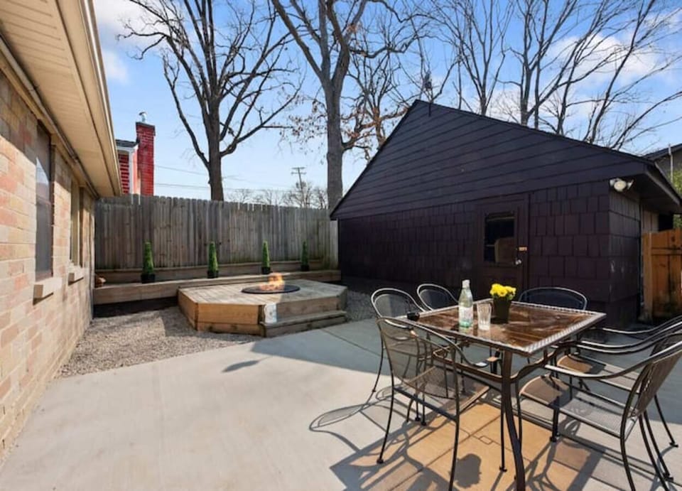 Lovely outdoor space with a table to unwind.
