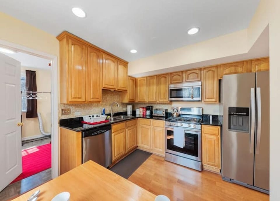 Fully equipped spacious kitchen for cooking ease.