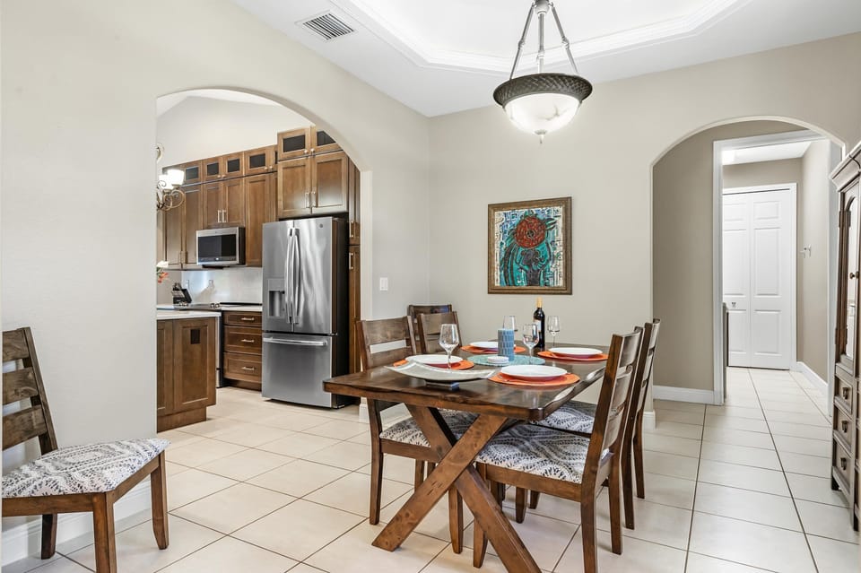 The dining area is right off the kitchen with seating for 6