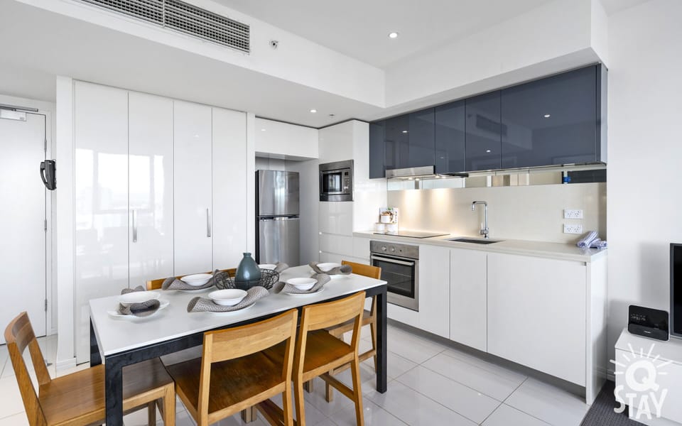 Fully equipped modern kitchen is right next to the dining area