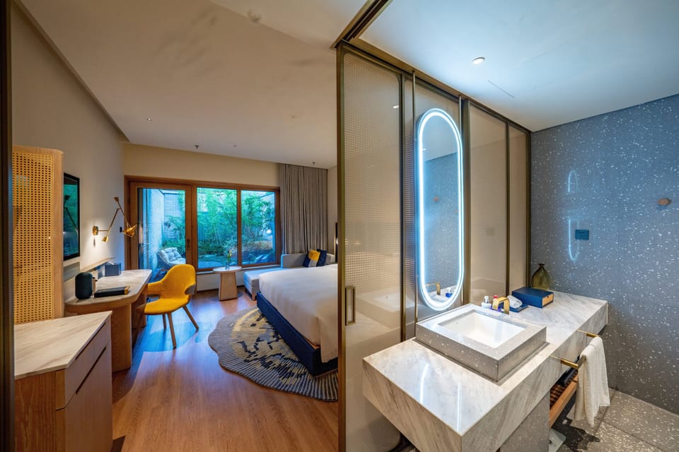Standard Room, 1 King Bed, Courtyard View (Private Hot Spring) | Free minibar items, in-room safe, blackout drapes, soundproofing