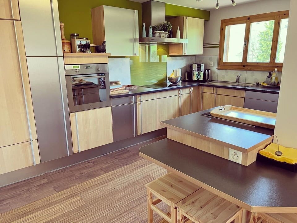 Cabinetry, Countertop, Kitchen Sink, Window, Wood, Interior Design, Kitchen, Kitchen Appliance, Flooring, Kitchen Stove
