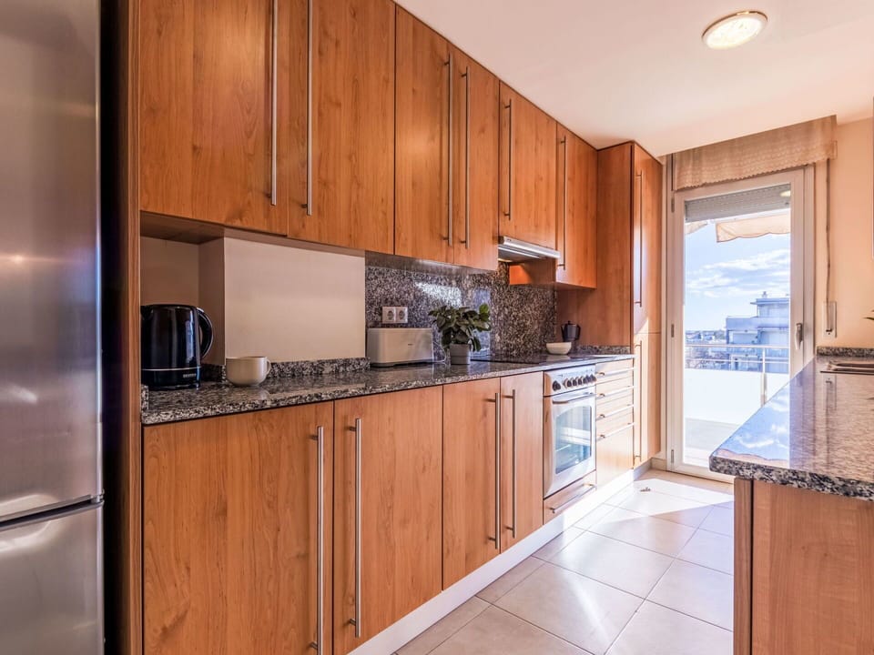 Kitchen, Flooring, Major Appliance, Wood, Countertop, Cabinetry, Kitchen Appliance, Floor, Interior Design, Apartment