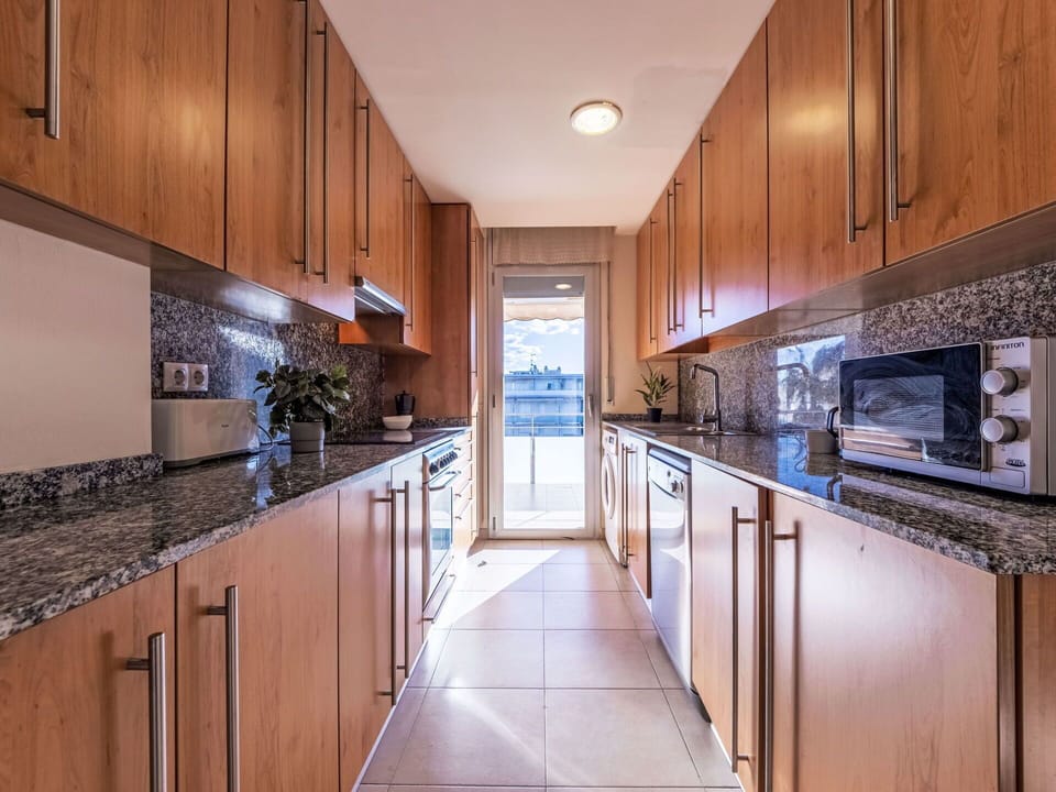 Kitchen, Flooring, Countertop, Interior Design, Floor, Wood, Major Appliance, Kitchen Appliance, Cabinetry, Furniture