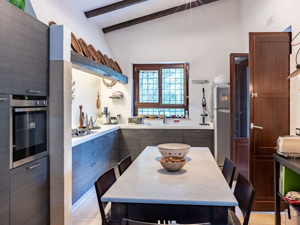 Cabinetry, Furniture, Property, Countertop, Table, Tap, Sink, Window, Kitchen, Wood