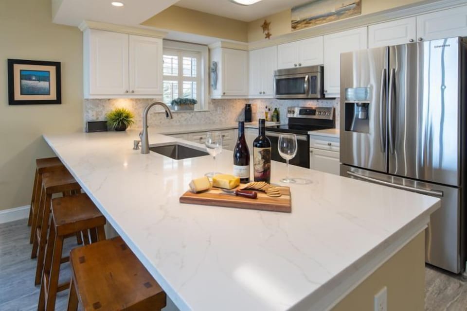 Updated modern kitchen with breakfast bar.