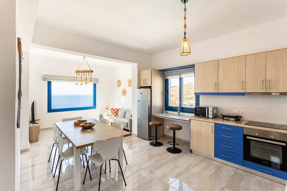 A kitchen with all the essentials for your cooking needs.