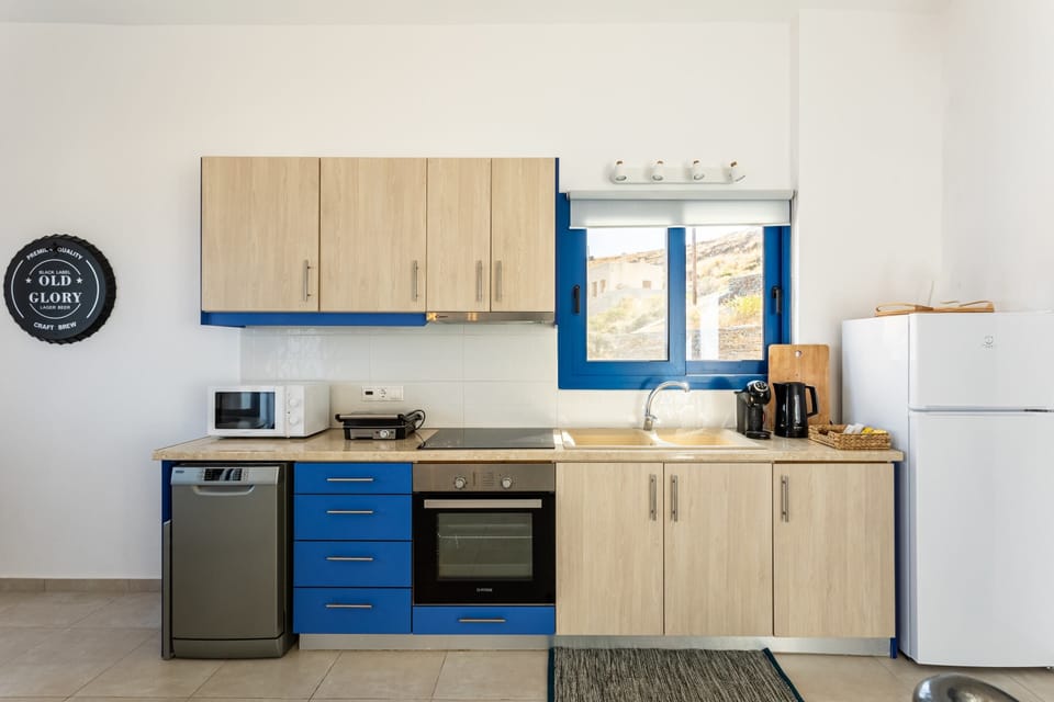 A kitchen with all the essentials for your cooking needs.