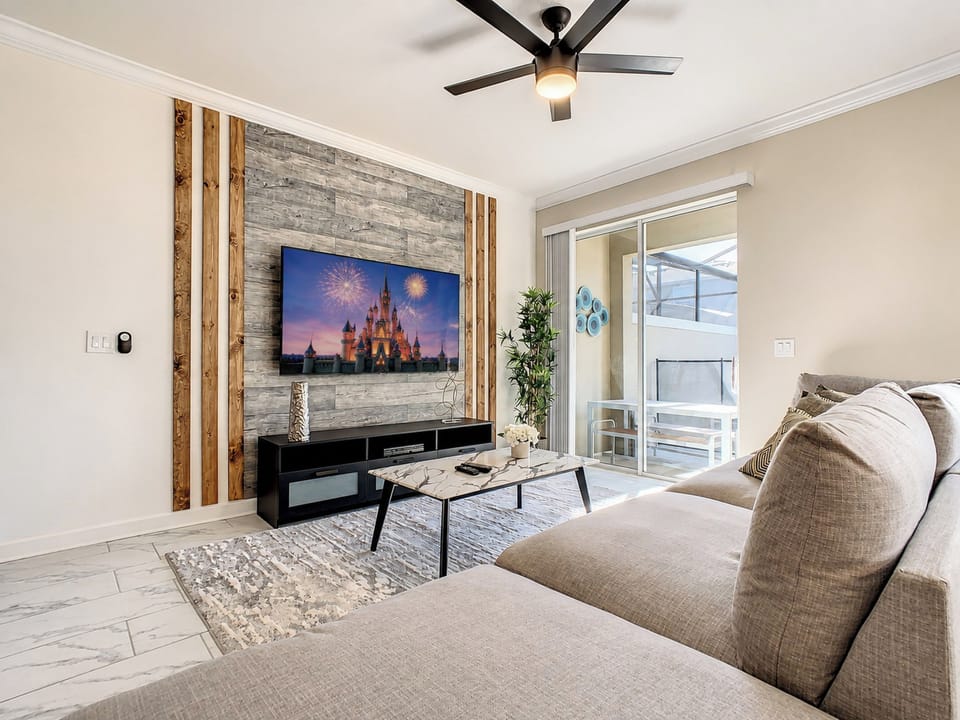 Stylish Living Room with Smart TV and Patio Access