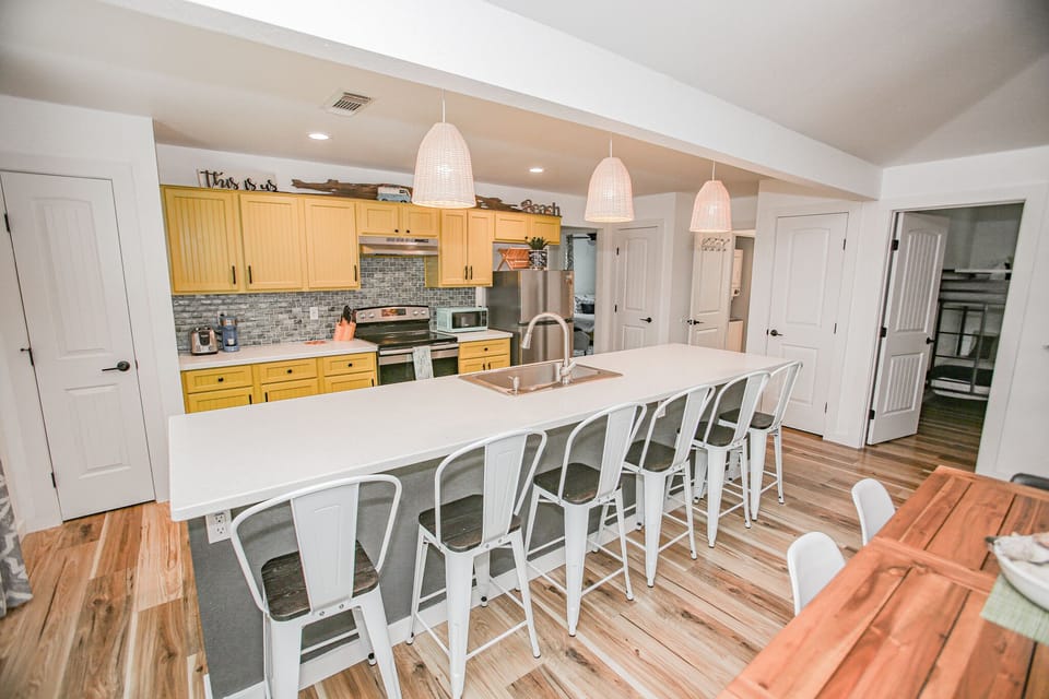 Kitchen island seats 6 more guests