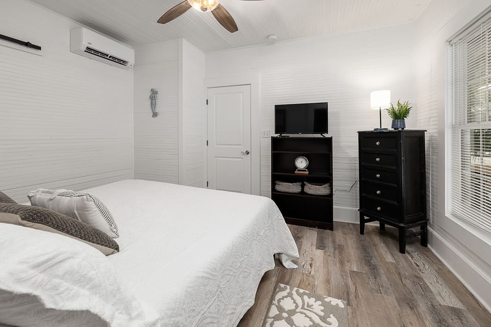 Bedroom 2 with King Bed and access to outside patio