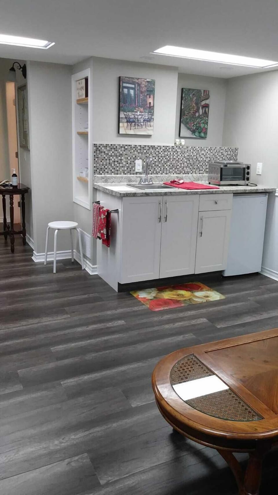 Bar sink, fridge, toaster oven and microwave 