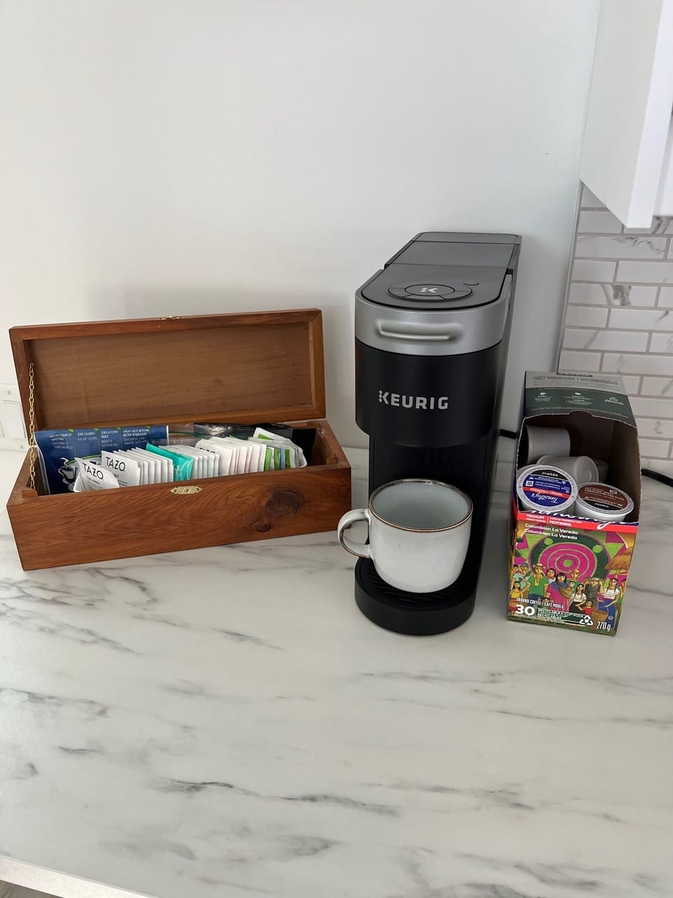 Kuerig Coffee pods and assortment of teas fully stocked.