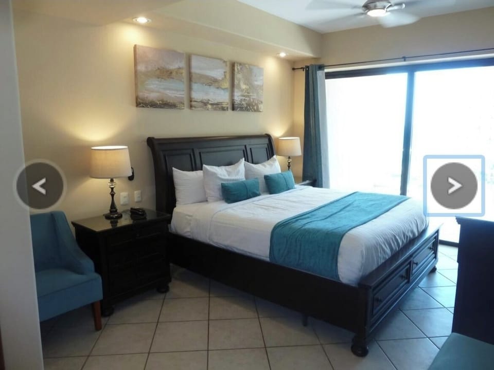 Master bedroom. Ocean view, access to balcony.