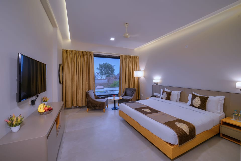 Deluxe Room | In-room safe, desk, laptop workspace, iron/ironing board