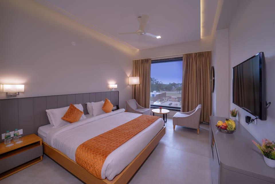 Deluxe Room | In-room safe, desk, laptop workspace, iron/ironing board