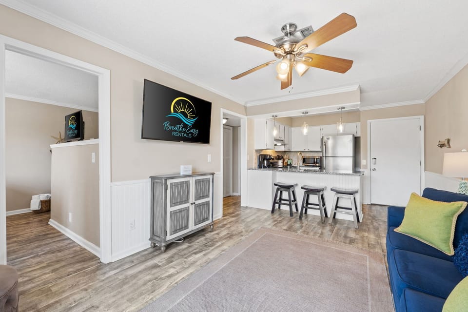 Coastal comfort meets convenience in this airy living space.