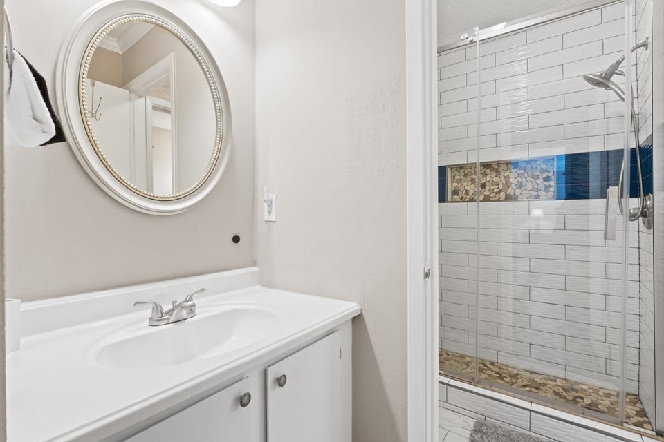 Freshen up in the modern walk-in tiled shower.
