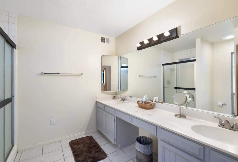 Master bathroom with double vanity and spacious walk in shower