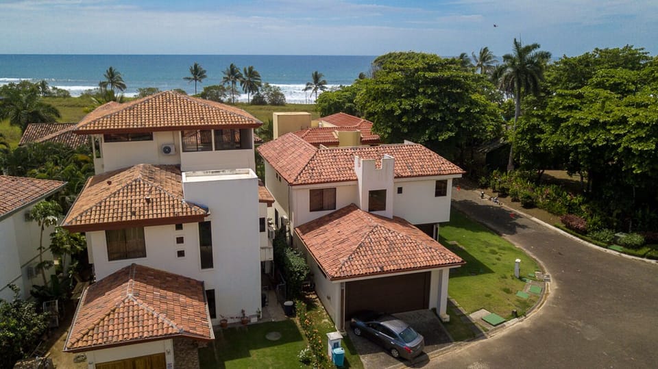 Drone shot of the house and neighborhood. My house is on the left.