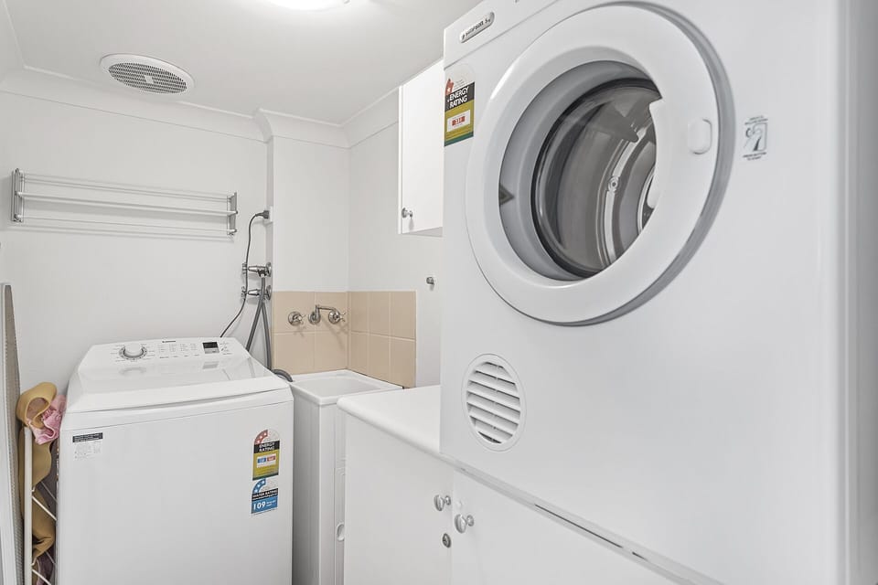 Laundry with washer and dryer.