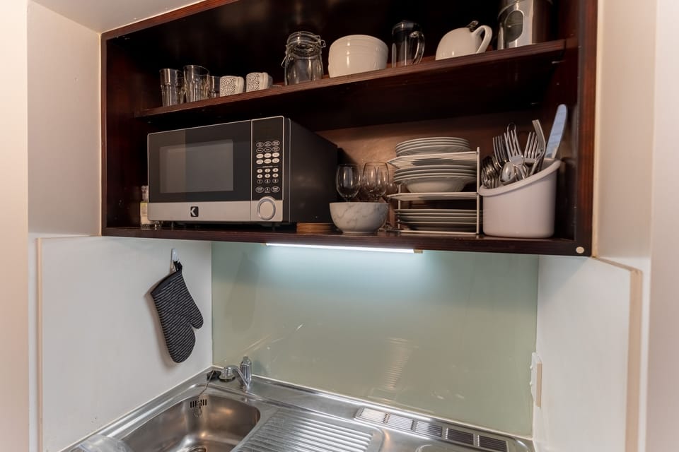 Apartment | Private kitchen | Mini-fridge, microwave, stovetop, coffee/tea maker