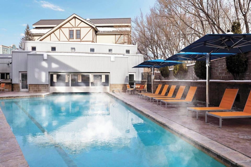 Heated indoor/outdoor pool for year-round entertainment.