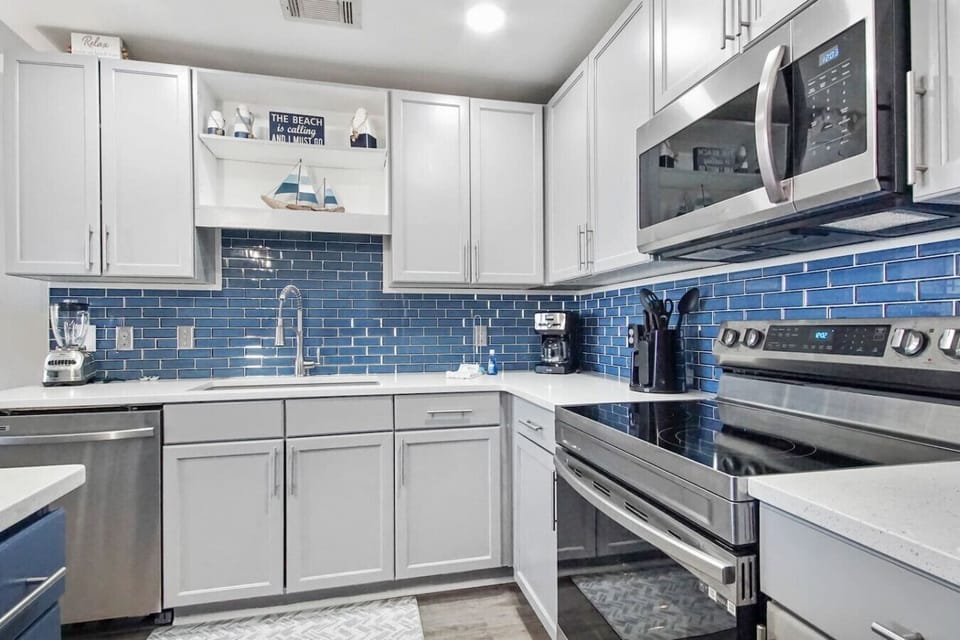 Fully Stocked Kitchen with Stainless Steel Appliances, Drip Coffee Maker, Keurig and Island Bar Seating