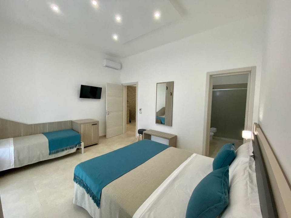 Basic Triple Room | Premium bedding, memory foam beds, in-room safe, free WiFi