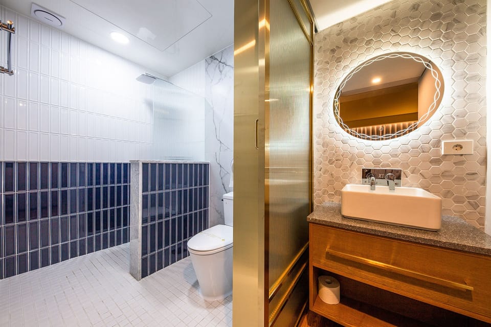 Jetted tub, free toiletries, hair dryer, bathrobes