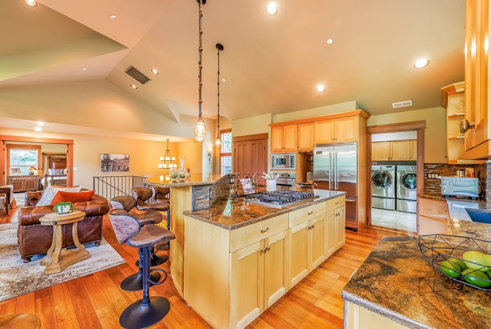 Open Layout Kitchen & Living Area With Warm Wood Finishes + Designer Touches